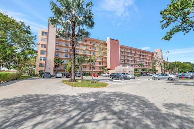14671 Bonaire Blvd Unit 510, Delray Beach, FL 33446 - view of apartment building / complex with uncovered parking
