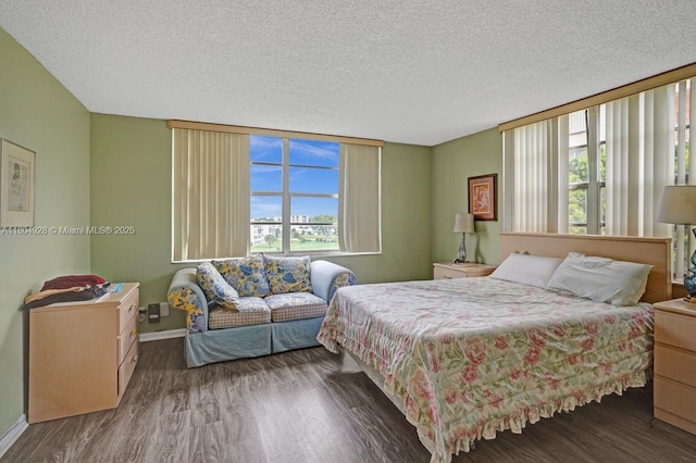14671 Bonaire Blvd Unit 510, Delray Beach, FL 33446 - bedroom with wood finished floors, baseboards, and a textured ceiling