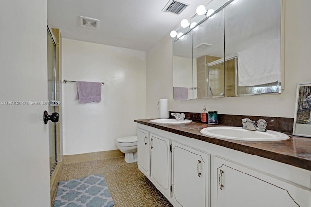 14671 Bonaire Blvd Unit 510, Delray Beach, FL 33446 - full bathroom featuring a shower with door, double vanity, and toilet