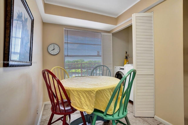 14671 Bonaire Blvd Unit 510, Delray Beach, FL 33446 - dining area with plenty of natural light, baseboards, and light tile patterned floors