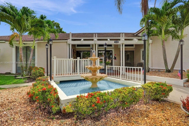 14671 Bonaire Blvd Unit 510, Delray Beach, FL 33446 - rear view of house with stucco siding