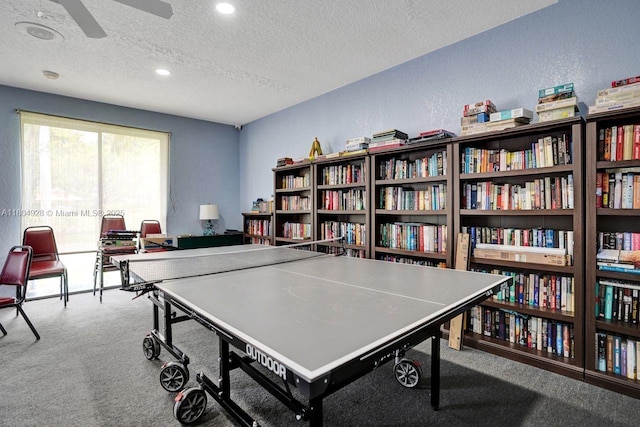 14671 Bonaire Blvd Unit 510, Delray Beach, FL 33446 - game room featuring carpet flooring, a textured ceiling, ceiling fan, a textured wall, and recessed lighting