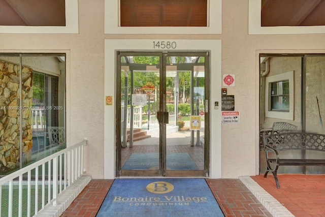 14671 Bonaire Blvd Unit 510, Delray Beach, FL 33446 - property entrance with stucco siding