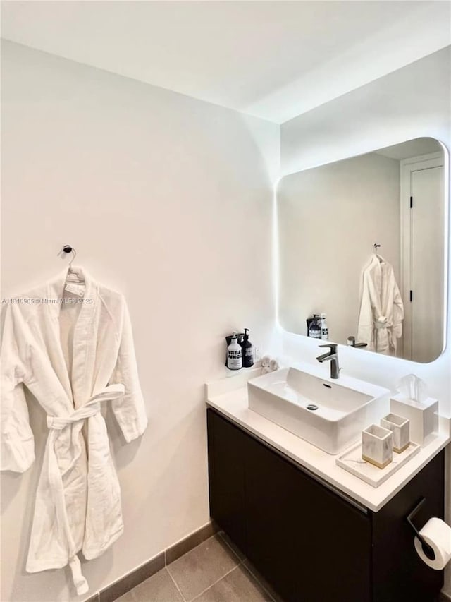 227 NE 2nd St Unit 2713, Miami, FL 33132 - bathroom with vanity, tile patterned flooring, and baseboards