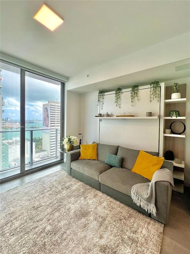 227 NE 2nd St Unit 2713, Miami, FL 33132 - tiled living area featuring expansive windows