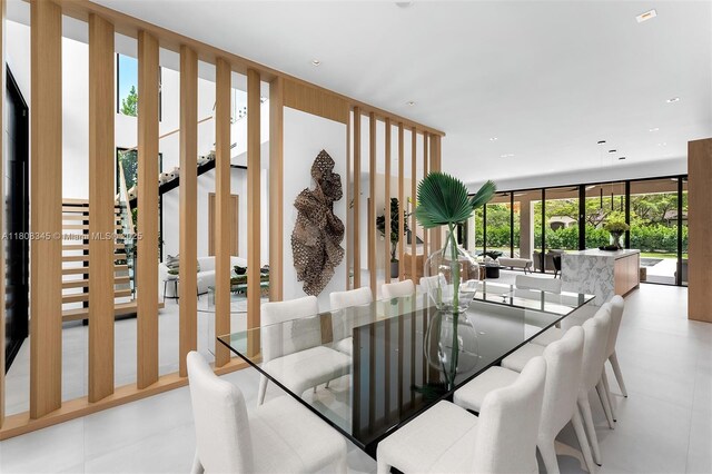 11001 SW 65th Ave, Pinecrest, FL 33156 - dining space with floor to ceiling windows and recessed lighting