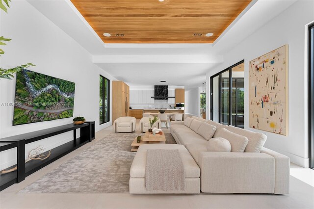 11001 SW 65th Ave, Pinecrest, FL 33156 - living room featuring wooden ceiling and a raised ceiling