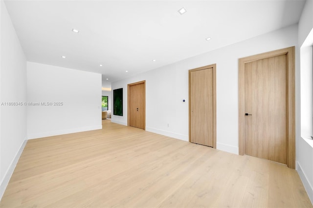11001 SW 65th Ave, Pinecrest, FL 33156 - spare room featuring light wood finished floors, recessed lighting, and baseboards