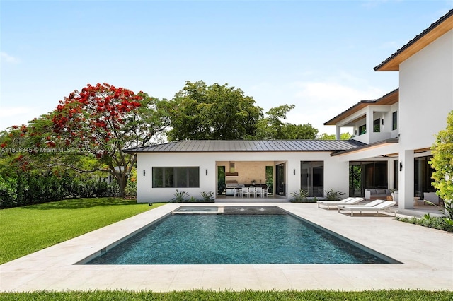 11001 SW 65th Ave, Pinecrest, FL 33156 - back of house with a standing seam roof, stucco siding, and a patio area