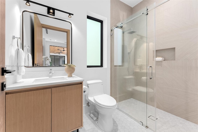 11001 SW 65th Ave, Pinecrest, FL 33156 - bathroom with toilet, vanity, and a shower stall