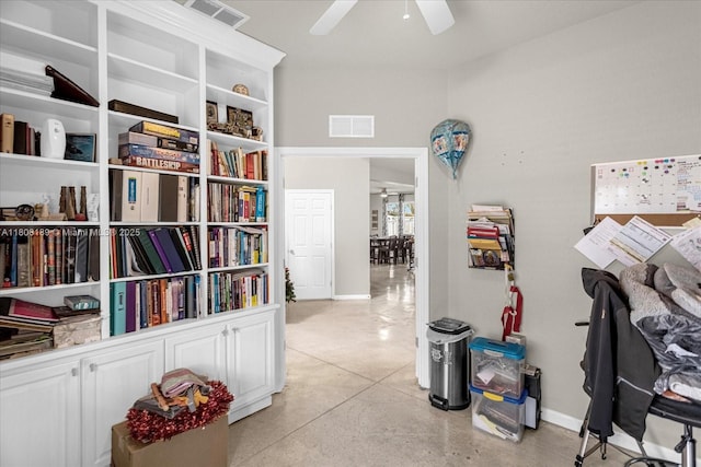 5781 SW 39th St, Ocala, FL 34474 - home office with a ceiling fan, baseboards, and concrete floors