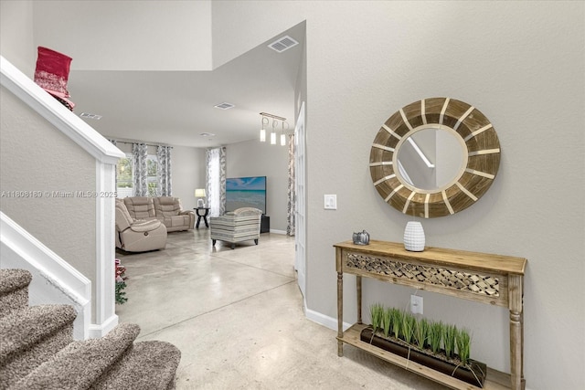 5781 SW 39th St, Ocala, FL 34474 - corridor featuring concrete floors, stairway, and baseboards