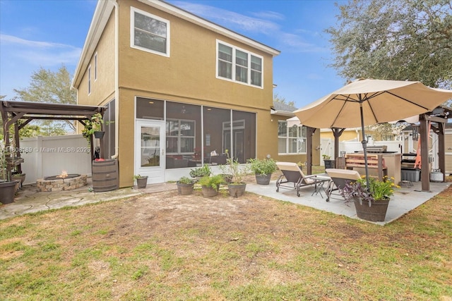 5781 SW 39th St, Ocala, FL 34474 - rear view of house with a patio and stucco siding