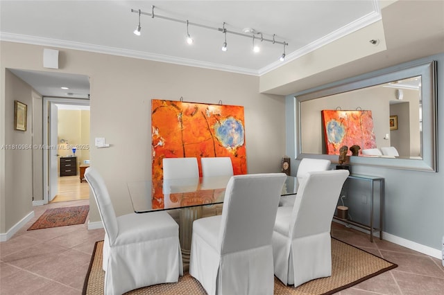 9 Island Ave Unit 505, Miami Beach, FL 33139 - dining room with crown molding and tile patterned floors