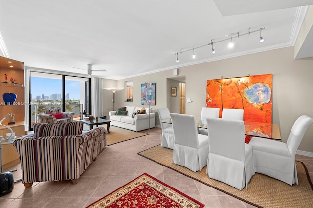9 Island Ave Unit 505, Miami Beach, FL 33139 - dining space with crown molding, tile patterned floors, rail lighting, and a ceiling fan
