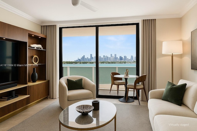 9 Island Ave Unit 505, Miami Beach, FL 33139 - living room with ornamental molding, a view of skyline, healthy amount of natural light, and a ceiling fan