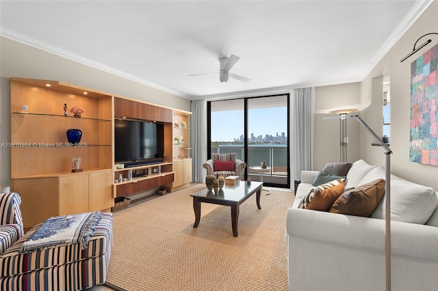 9 Island Ave Unit 505, Miami Beach, FL 33139 - living room with ornamental molding, ceiling fan, and light carpet