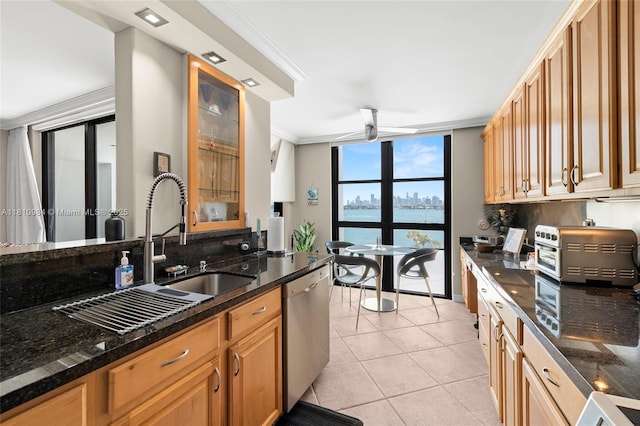 9 Island Ave Unit 505, Miami Beach, FL 33139 - kitchen featuring stainless steel dishwasher, a wall of windows, light tile patterned floors, crown molding, and glass insert cabinets
