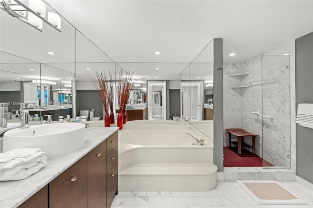 9 Island Ave Unit 505, Miami Beach, FL 33139 - full bath featuring marble look tiles, a stall shower, a bath, vanity, and recessed lighting