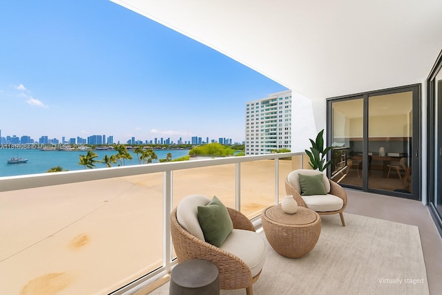 9 Island Ave Unit 505, Miami Beach, FL 33139 - balcony featuring a skyline view and a water view