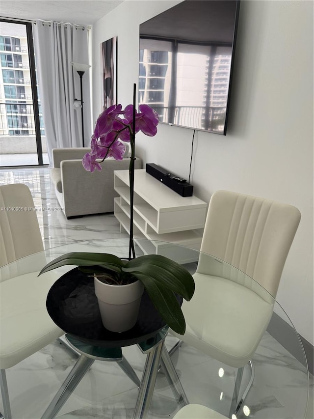 555 NE 15th St Unit 15G, Miami, FL 33132 - sitting room with marble look tile flooring