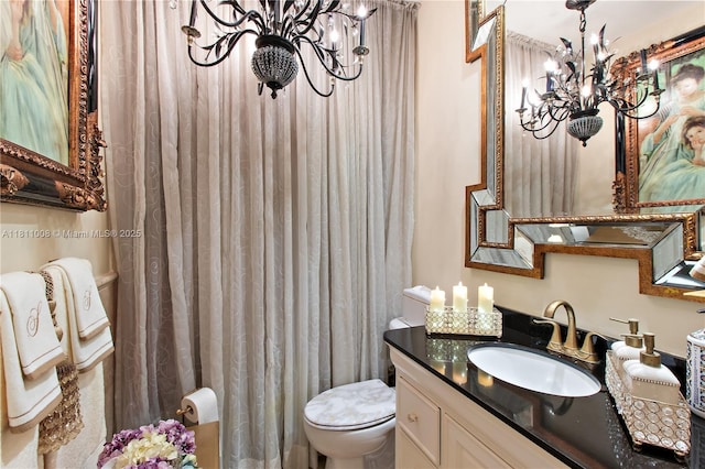 1805 Ponce De Leon Blvd Unit 1200, Coral Gables, FL 33134 - bathroom featuring a chandelier, vanity, toilet, and a shower with curtain