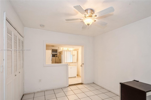 4697 SW 35th Ave, Dania Beach, FL 33312 - unfurnished bedroom with a closet, a ceiling fan, connected bathroom, and baseboards