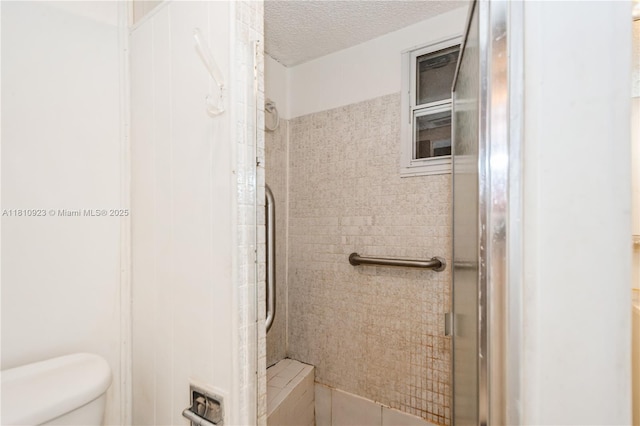 4697 SW 35th Ave, Dania Beach, FL 33312 - full bath with a shower stall, toilet, and a textured ceiling
