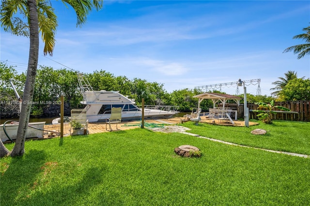 4697 SW 35th Ave, Dania Beach, FL 33312 - view of yard featuring a dock