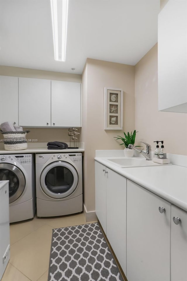 1 N Ocean Blvd Unit 508, Pompano Beach, FL 33062 - laundry area with cabinet space, washing machine and dryer, and light tile patterned floors