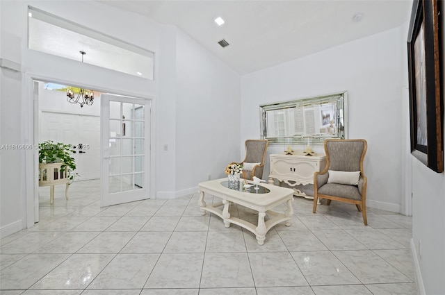 13236 SW 51st St, Miramar, FL 33027 - sitting room featuring a chandelier, baseboards, and high vaulted ceiling