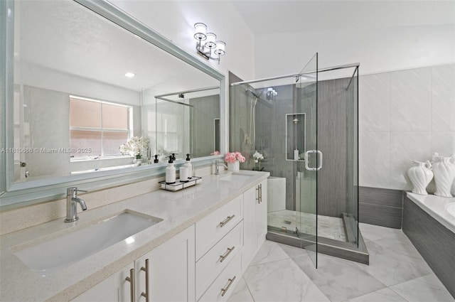 13236 SW 51st St, Miramar, FL 33027 - bathroom featuring a garden tub, marble finish floors, a shower stall, double vanity, and tile walls