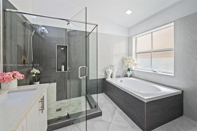 13236 SW 51st St, Miramar, FL 33027 - full bath featuring marble finish floors, a garden tub, vanity, a shower stall, and vaulted ceiling