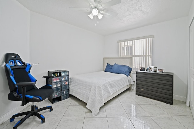 13236 SW 51st St, Miramar, FL 33027 - bedroom with a textured ceiling, ceiling fan, and baseboards