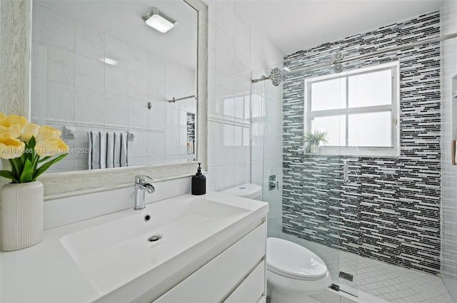 13236 SW 51st St, Miramar, FL 33027 - full bathroom featuring tile walls, toilet, a shower stall, and vanity