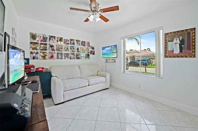 13236 SW 51st St, Miramar, FL 33027 - living area with a ceiling fan, baseboards, and light tile patterned flooring