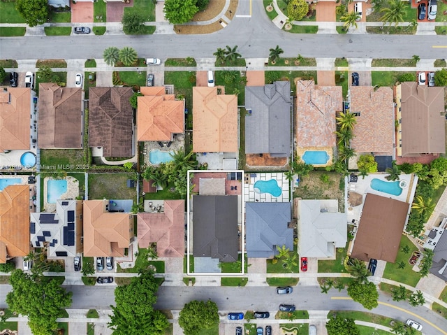 13236 SW 51st St, Miramar, FL 33027 - aerial view of property and surrounding area with a pool, nearby suburban area, and property parcel outlined