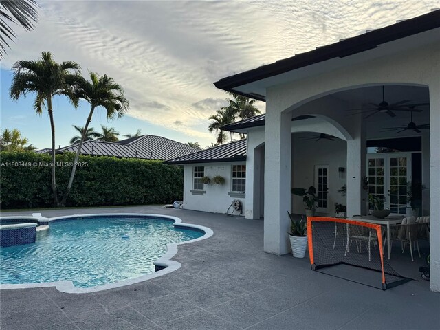 14601 SW 99th Ave, Miami, FL 33176 - view of swimming pool featuring ceiling fan, a pool with connected hot tub, and a patio area