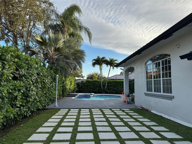 14601 SW 99th Ave, Miami, FL 33176 - view of pool with a fenced backyard and a patio area