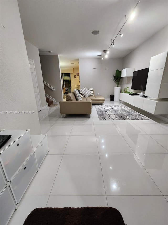 11249 NW 87th Ter, Doral, FL 33178 - living area with light tile patterned flooring and stairs