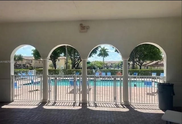 11249 NW 87th Ter, Doral, FL 33178 - community pool featuring a patio