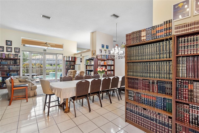 1357 Camellia Ln, Weston, FL 33326 - tiled dining space with a ceiling fan and a chandelier