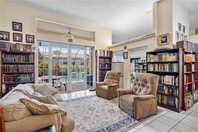 1357 Camellia Ln, Weston, FL 33326 - sitting room featuring tile patterned floors, ceiling fan, and a textured ceiling