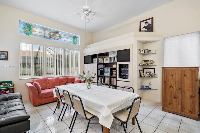 1357 Camellia Ln, Weston, FL 33326 - dining room featuring light tile patterned floors, a ceiling fan, and a towering ceiling