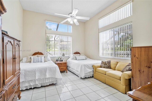 1357 Camellia Ln, Weston, FL 33326 - bedroom featuring light tile patterned floors and a ceiling fan
