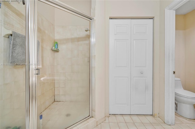 1357 Camellia Ln, Weston, FL 33326 - full bath with a stall shower, toilet, a closet, and tile patterned floors