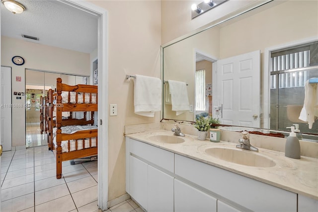 1357 Camellia Ln, Weston, FL 33326 - full bath featuring double vanity, ensuite bathroom, and tile patterned floors