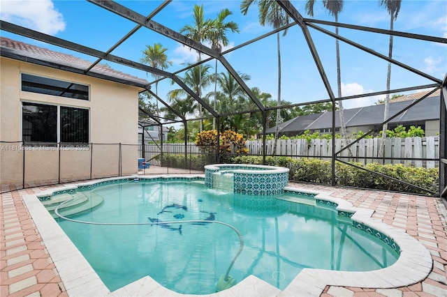 1357 Camellia Ln, Weston, FL 33326 - view of swimming pool with a pool with connected hot tub, glass enclosure, and a patio