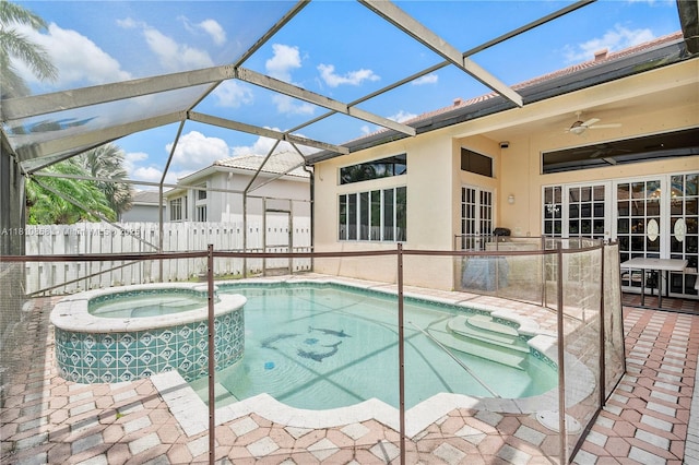 1357 Camellia Ln, Weston, FL 33326 - view of pool with a patio area, a pool with connected hot tub, ceiling fan, and glass enclosure