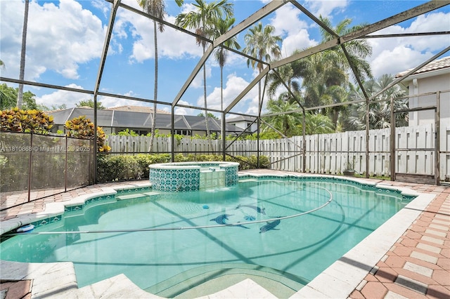 1357 Camellia Ln, Weston, FL 33326 - view of pool featuring a fenced backyard, a lanai, and a pool with connected hot tub
